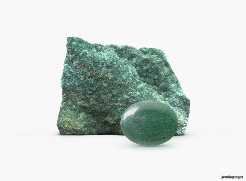 Tumbled green aventurine cabochon showing fuchsite mica shimmer on neutral background