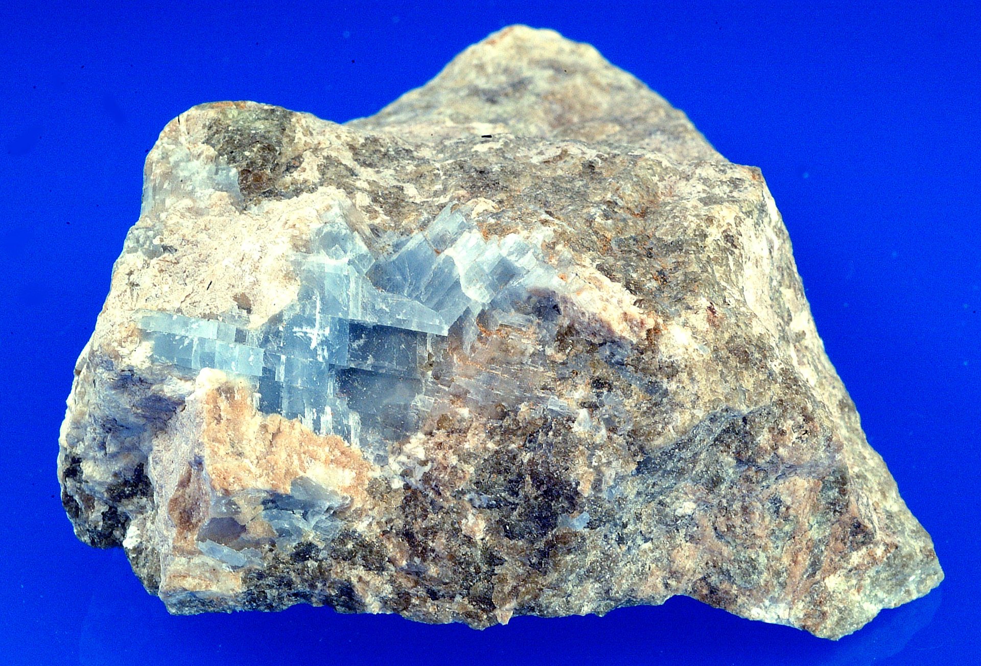 Blue calcite polished stone showing pale sky blue color with natural white banding from Mexico