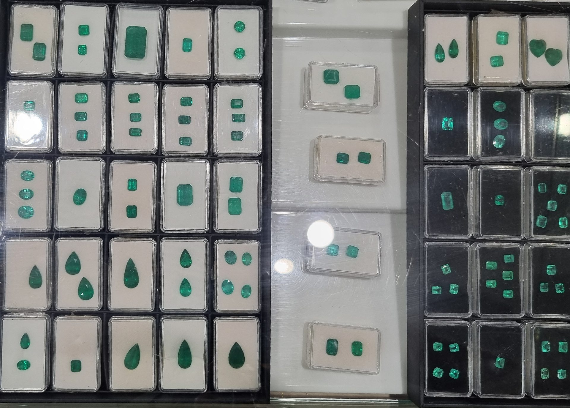 Faceted Brazilian emerald showing medium green color from Minas Gerais with visible natural character