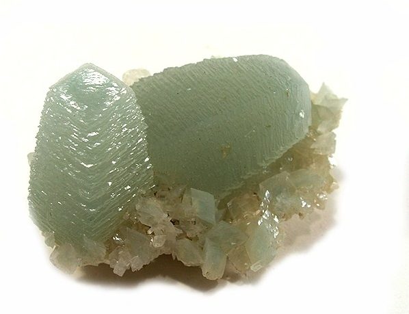 Polished Green Calcite specimen showing green calcium carbonate crystal