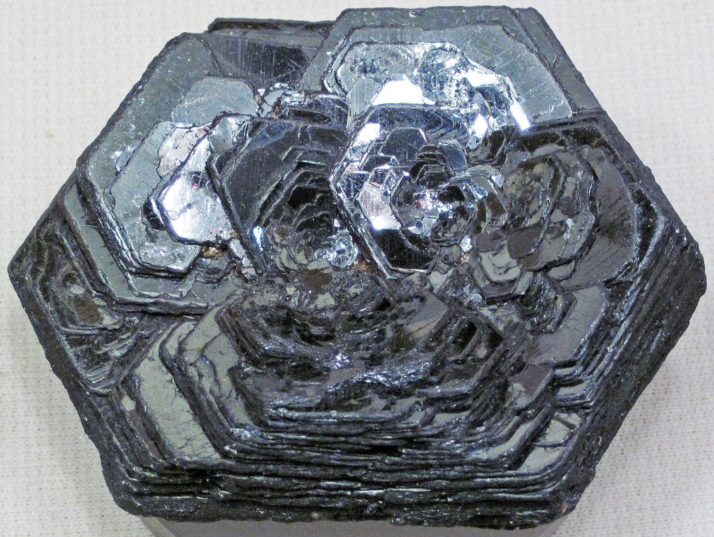 Hematite rose specimen showing fan of metallic gray tabular crystals arranged in rose formation