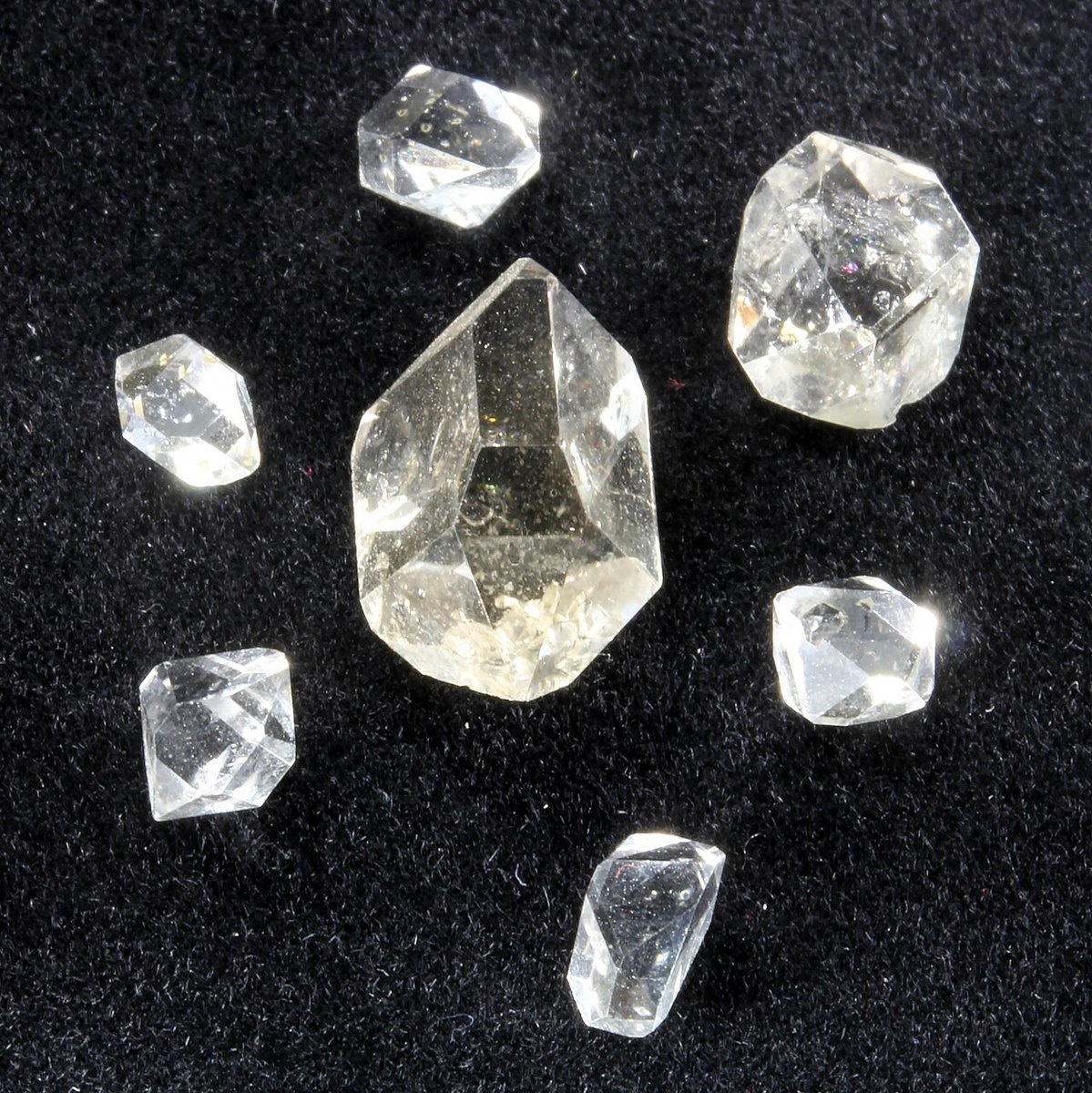 Herkimer diamond double-terminated quartz crystal showing exceptional clarity and natural facets on neutral background