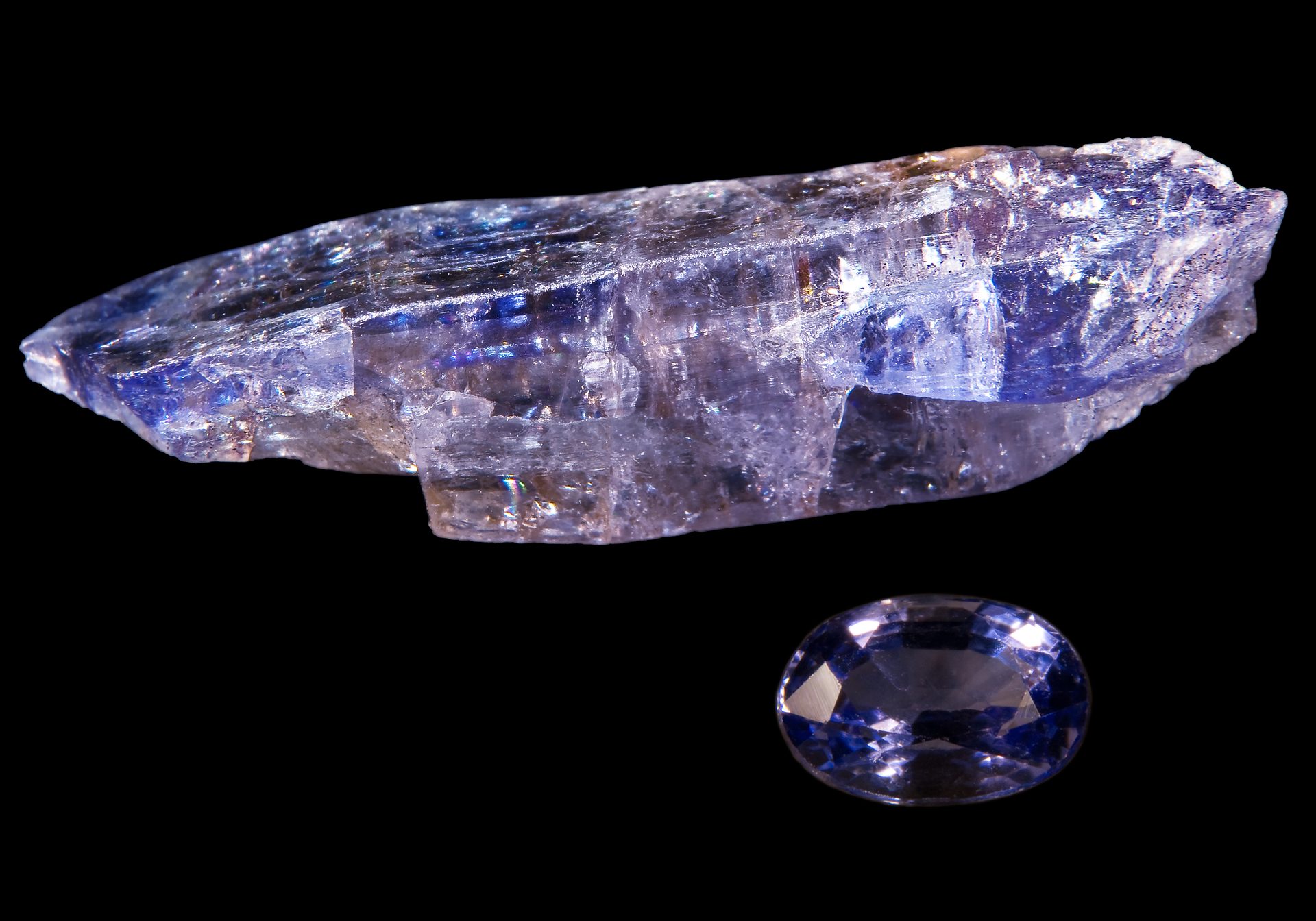 Faceted lab created tanzanite showing vivid blue-violet trichroic color shift