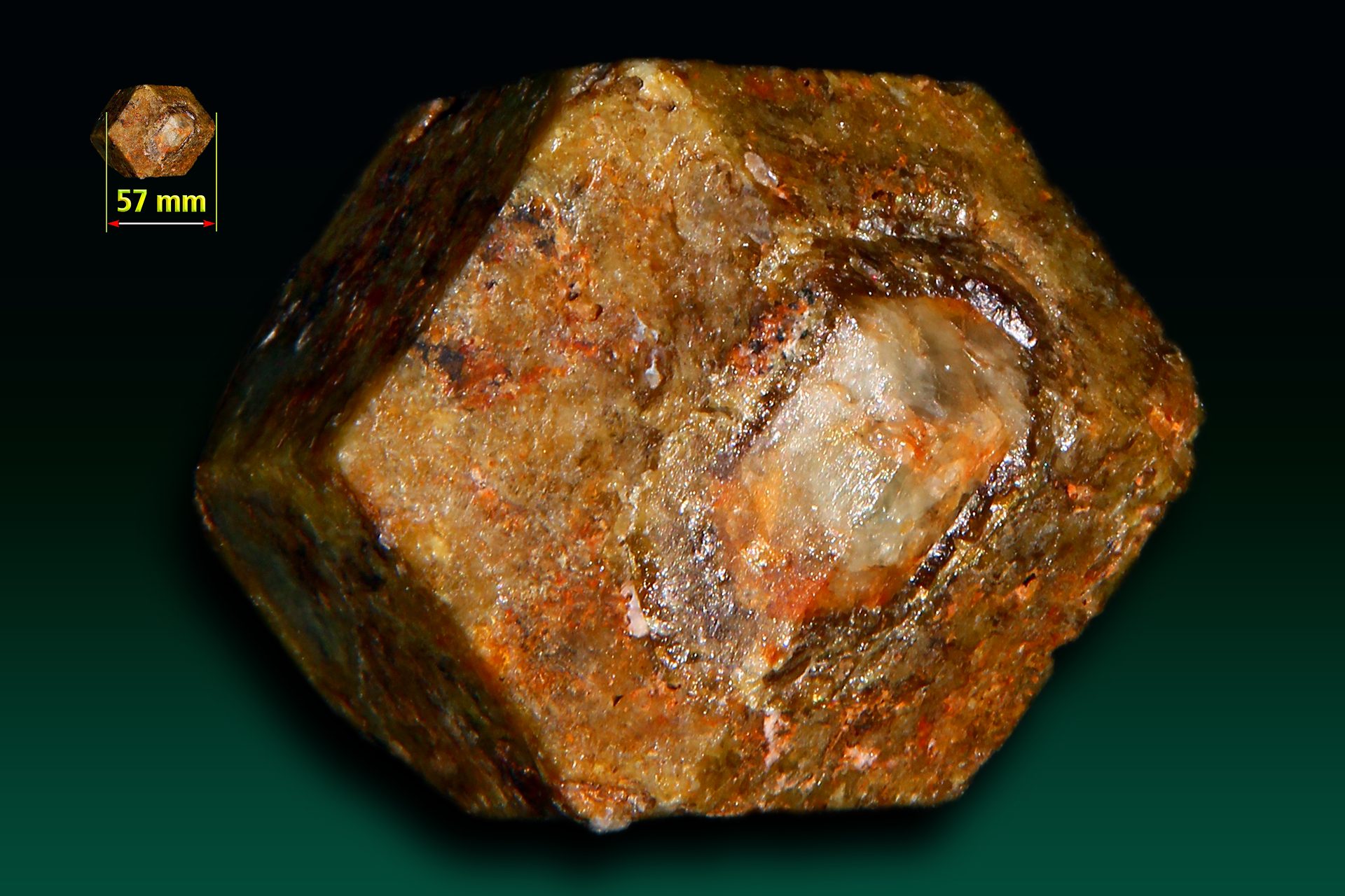 Mali garnet faceted stone showing yellow-green color with high dispersion
