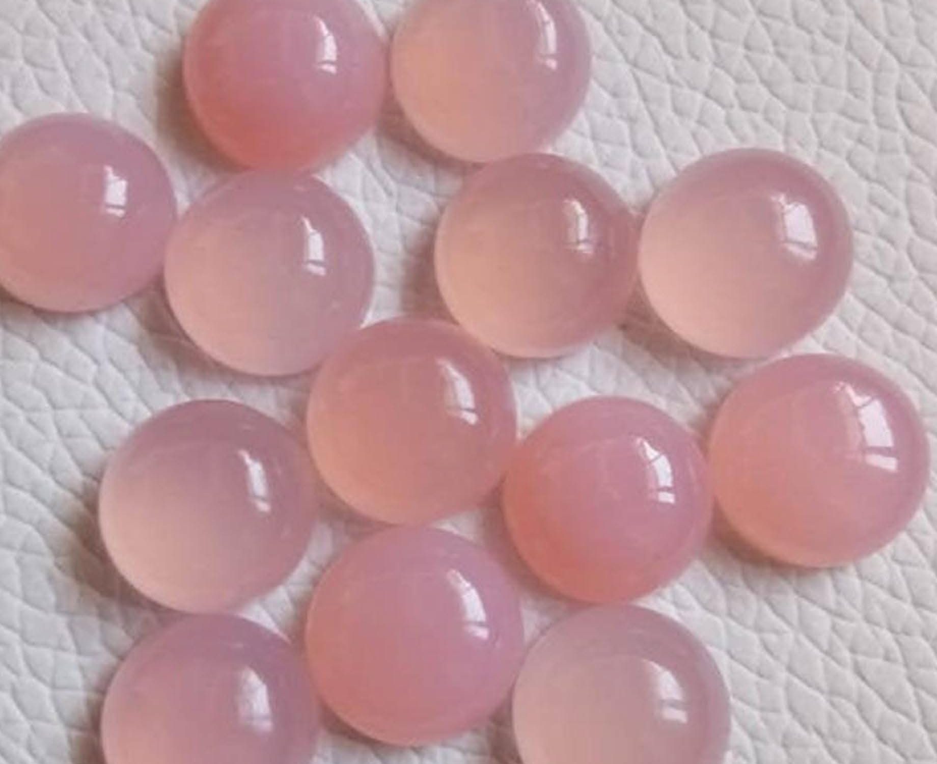 Pink chalcedony polished specimen showing soft rose to pale pink translucent color