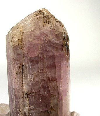 Faceted pink scapolite gemstone with delicate rose-pink color