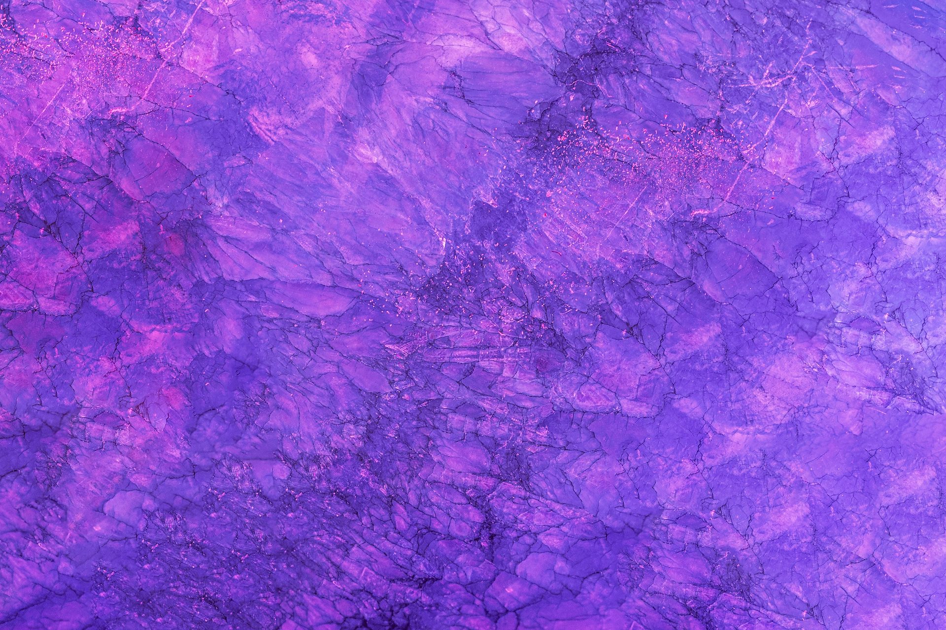 Purple opal polished specimen showing violet to lavender-purple color with silky waxy luster