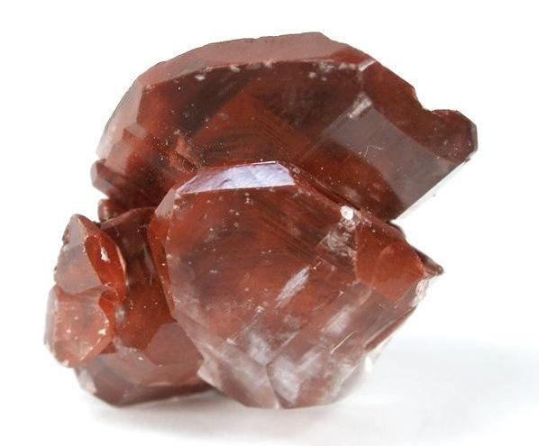 Polished Red Calcite specimen showing deep crimson-red calcium carbonate crystal mass with earthy warm tones