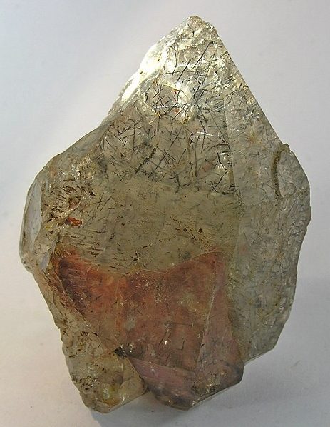 Polished tourmaline quartz sphere with black schorl needle inclusions in clear crystal matrix